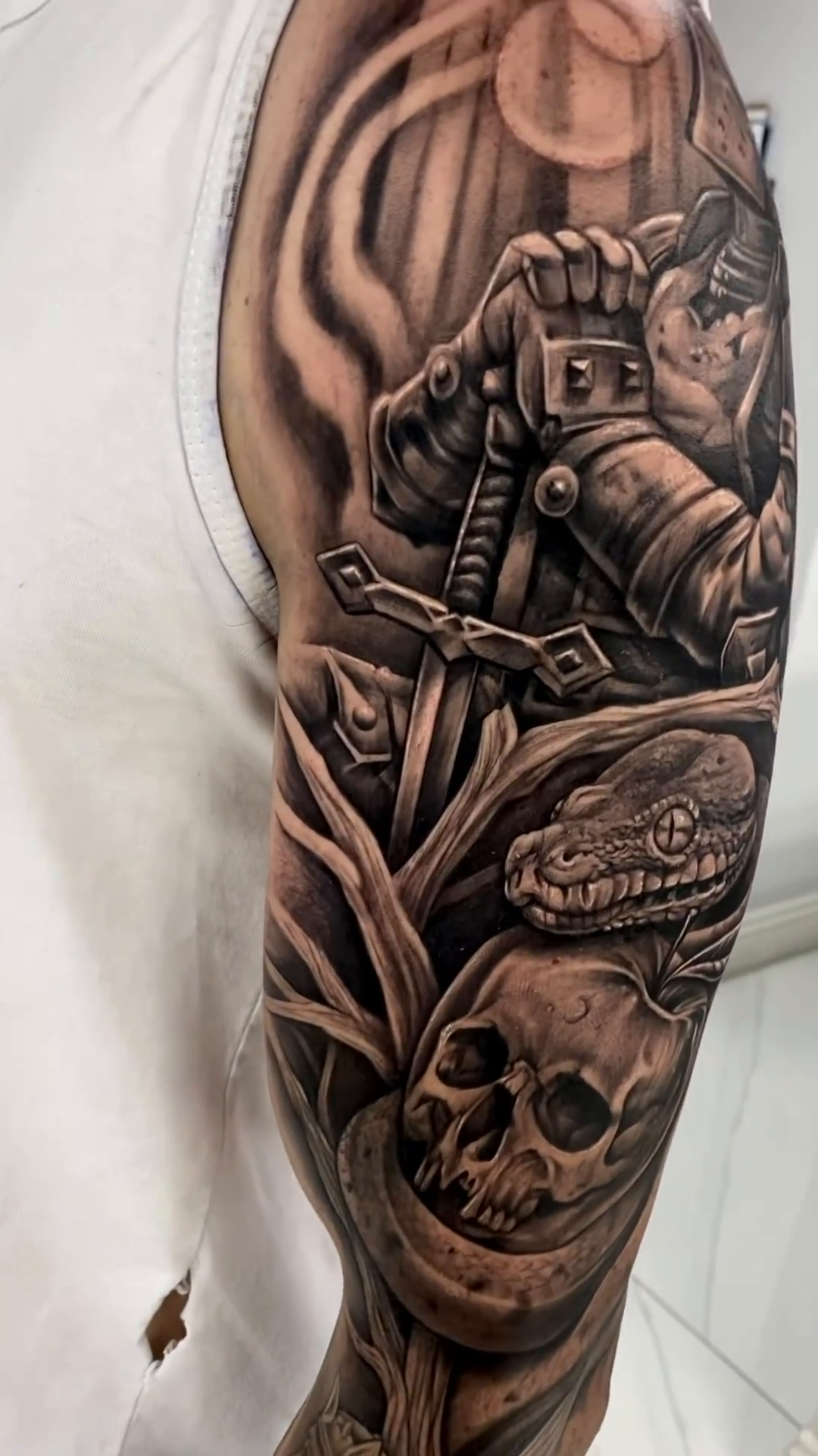 Knight with skulls and snake realism tattoo by RTK - ᴛᴀᴛᴛᴏᴏ ᴀʀᴛɪꜱᴛ