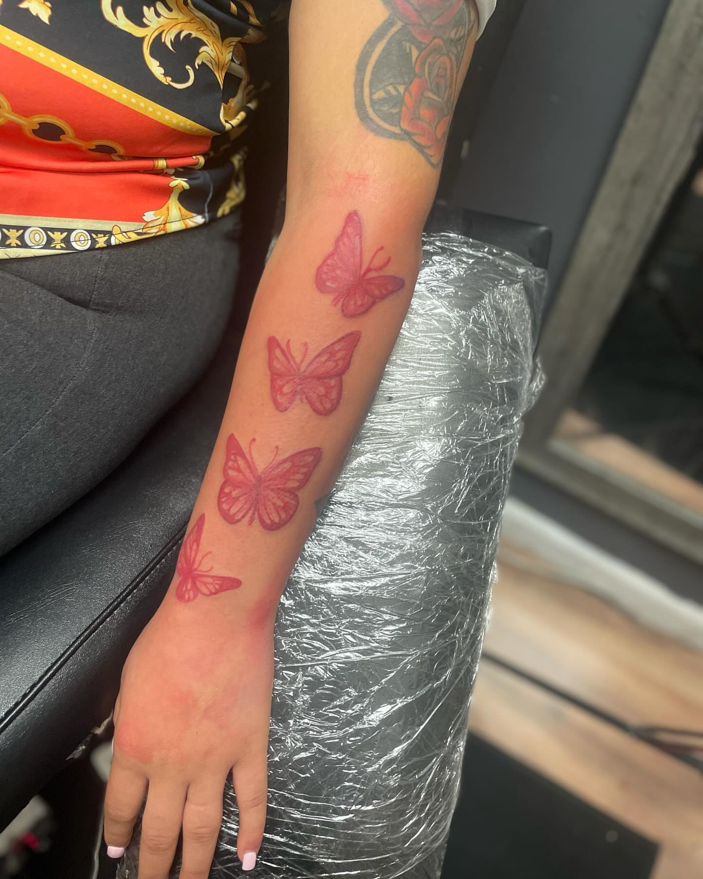 Butterflies dotwork tattoo on the forearm by Rell Washington, Marlow Heights, Maryland