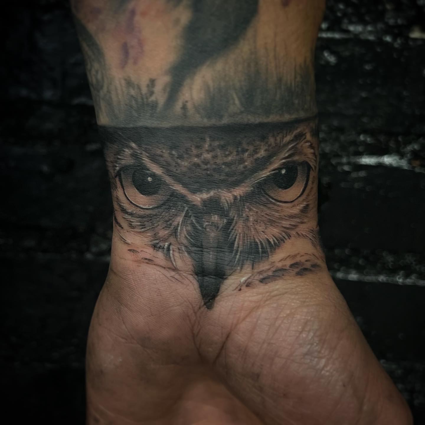 Owl realism tattoo on the forearm by Amber