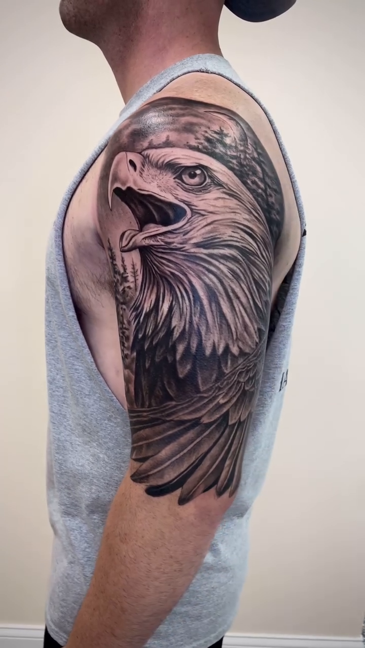 Eagle head realism tattoo by Charlie