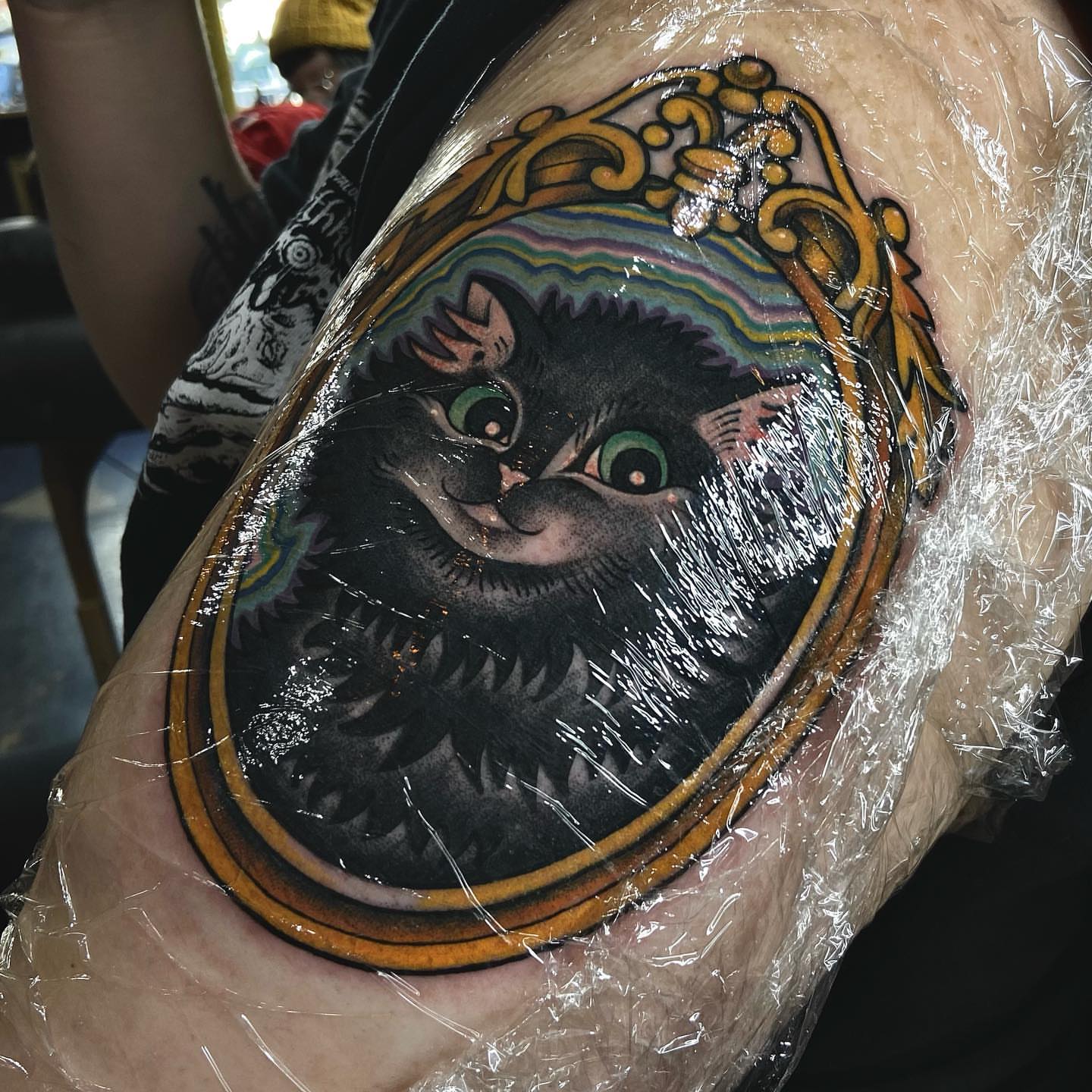 Cat realism tattoo on the thigh by Luna