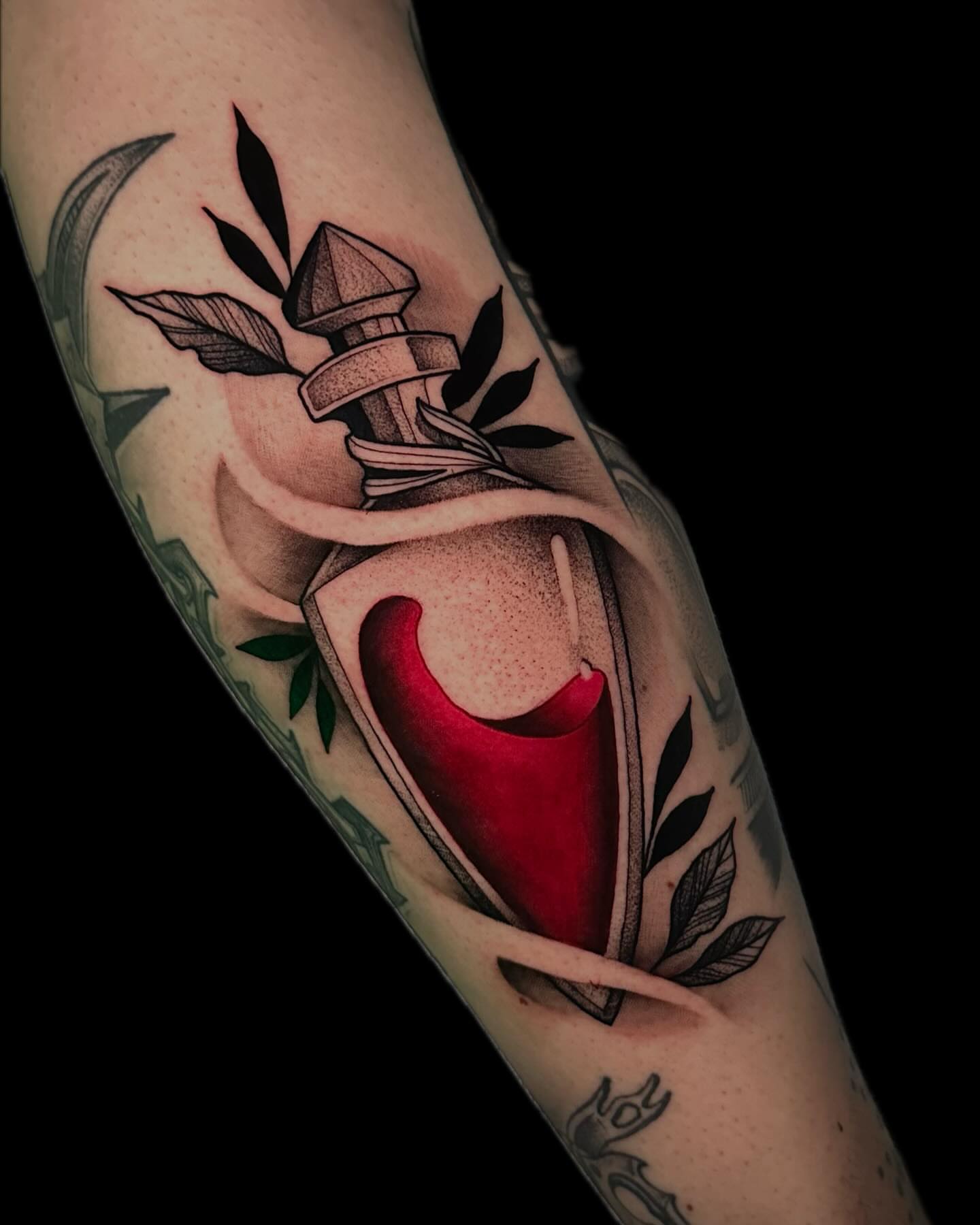 Heart in bottle American traditional tattoo on the forearm by Clayton Smith (BEAR)