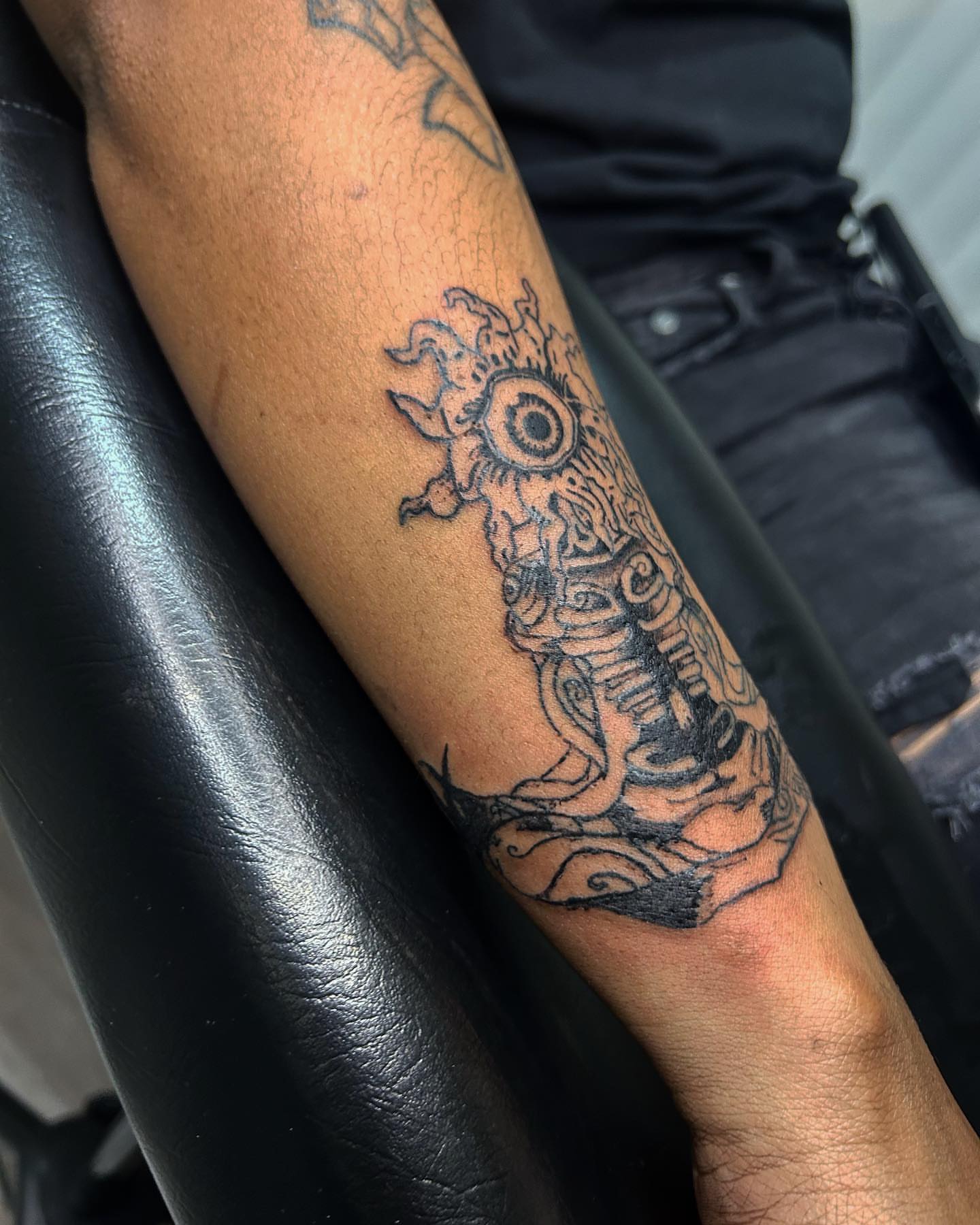 Eye and mechanical figure geometric tattoo on the forearm by Cleveland Tattoo Artist, Cleveland, Ohio