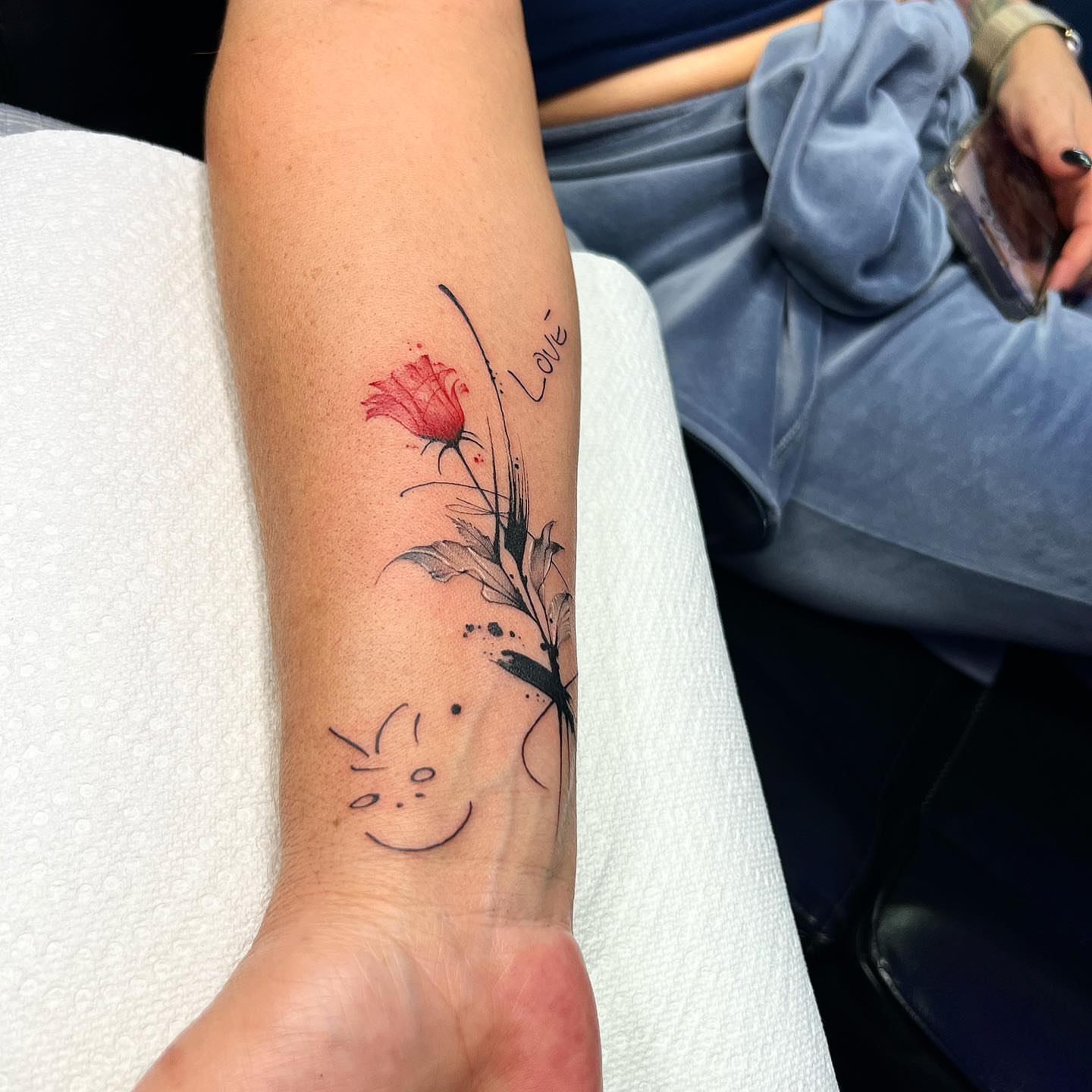 Flower and butterfly dotwork tattoo on the forearm by Denis Morello de Castro, South River, New Jersey