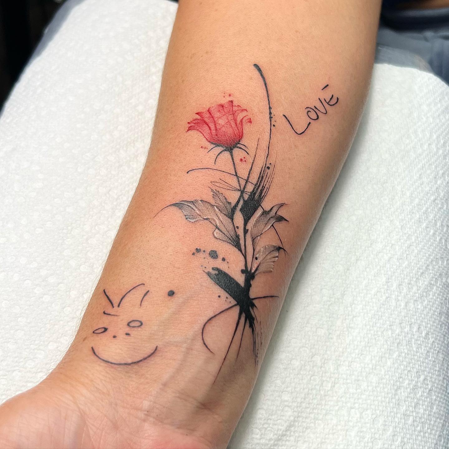 Rose and dragonfly dotwork tattoo on the forearm by Denis Morello de Castro, South River, New Jersey