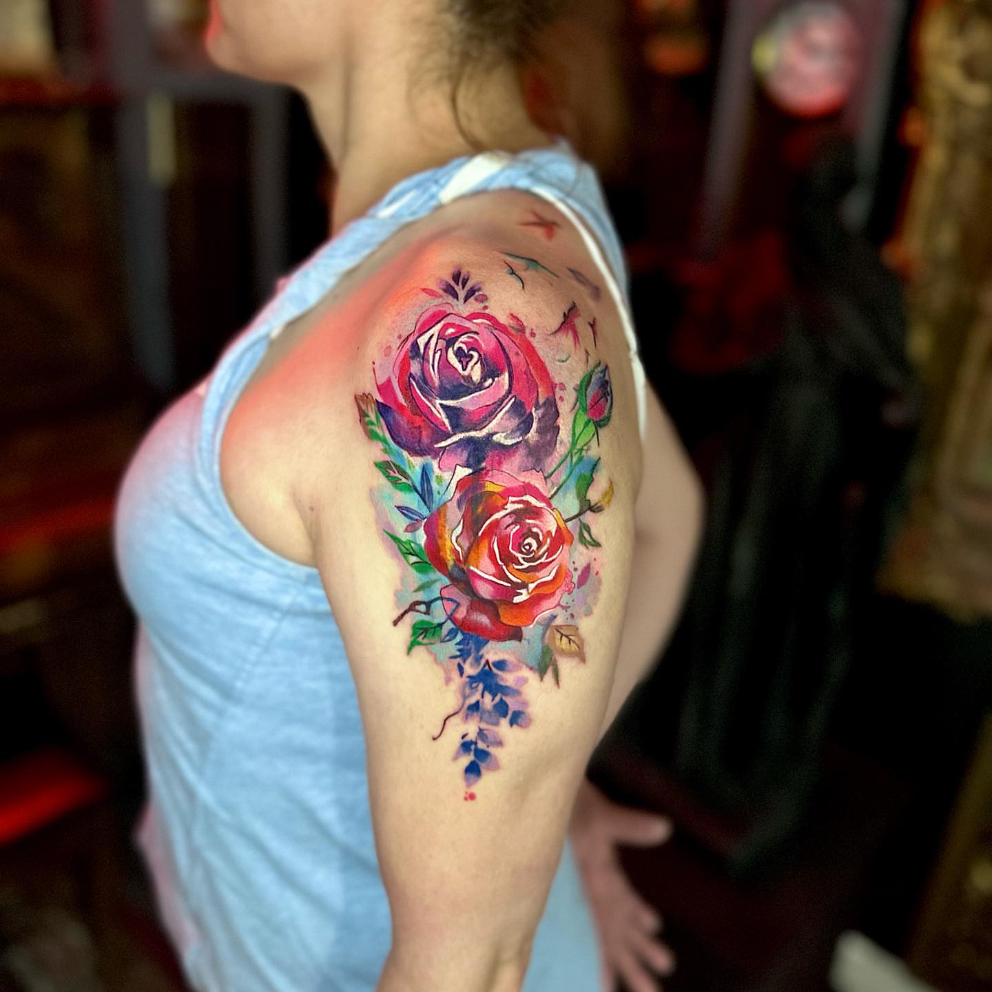 Watercolor roses watercolor tattoo on the shoulder by Juan Carlos