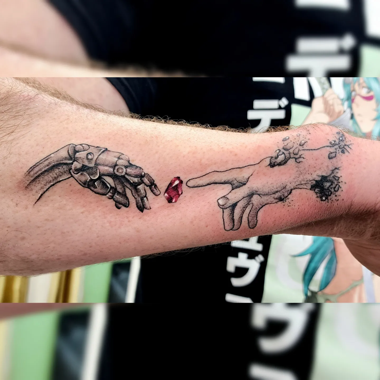 Robot hand and human hand realism tattoo on the forearm by Diane Maya