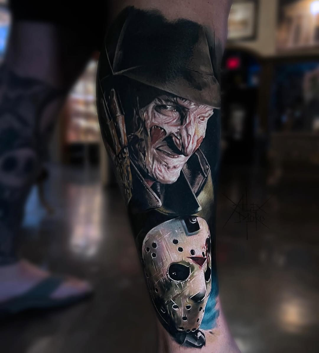 Freddy Krueger and Jason Voorhees mask realism tattoo on the forearm by Alex Moro