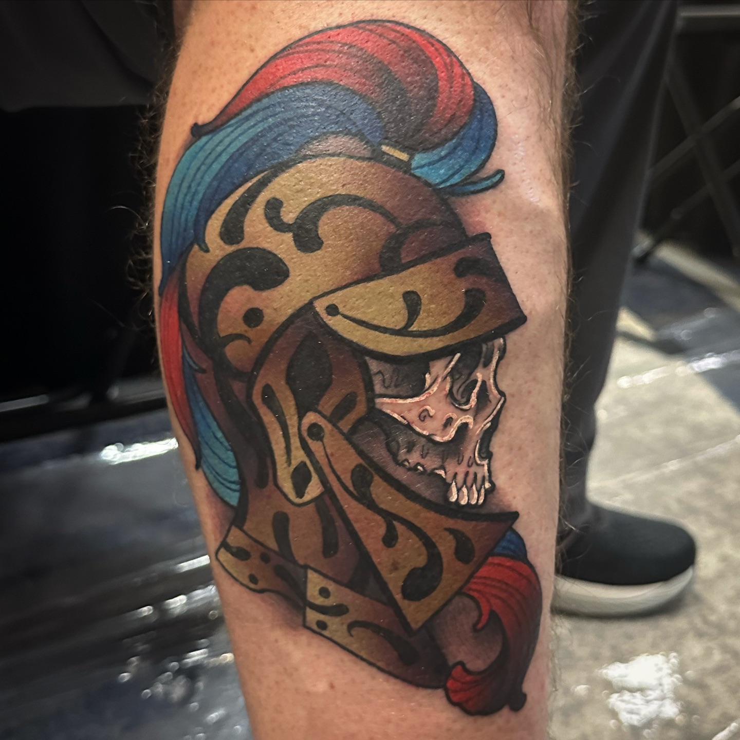 Skull with helmet American traditional tattoo on the forearm by gillian marie