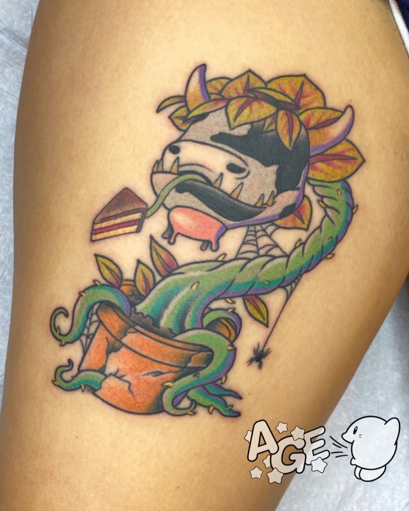 Snake and raccoon new school tattoo on the thigh by Otaku and Gamer Tattooer