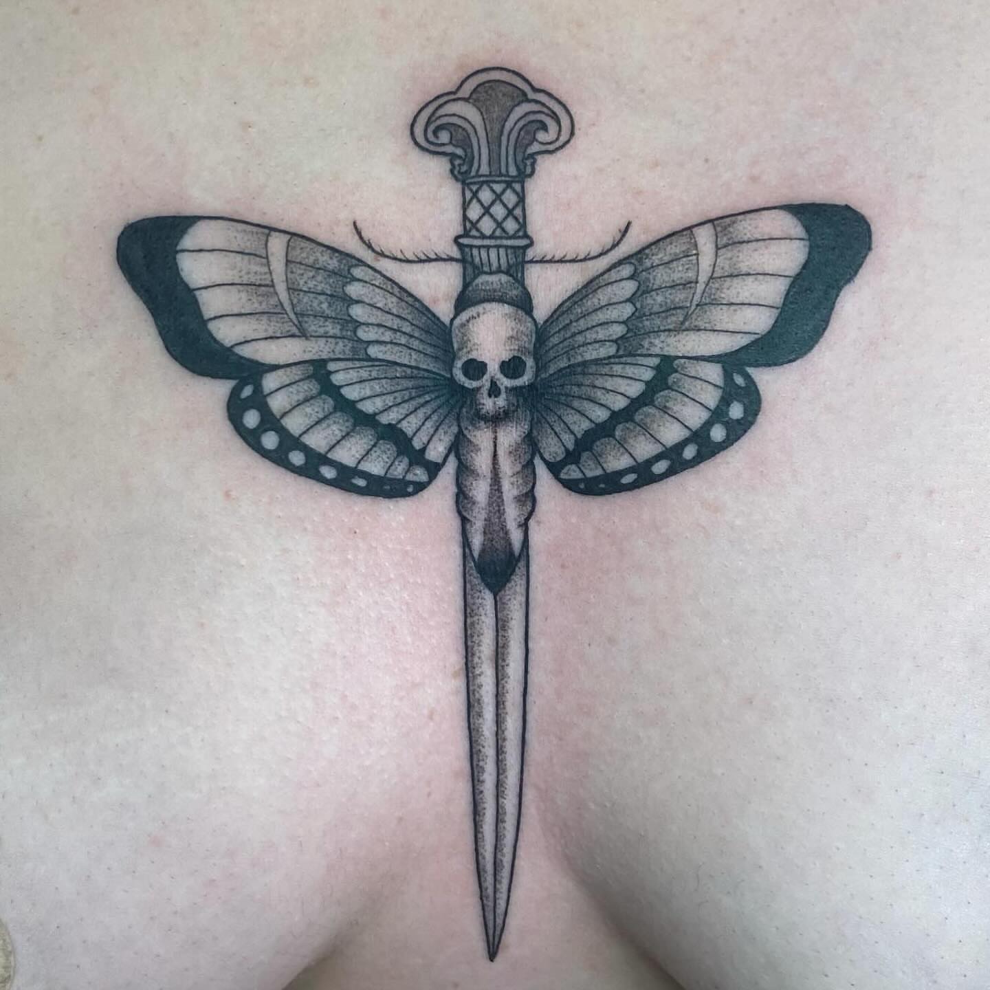 Butterfly and dagger dotwork tattoo on the back by 𝕤𝕒𝕣𝕒𝕙 𝕞𝕠𝕣𝕒𝕟📌, Dayton, Ohio