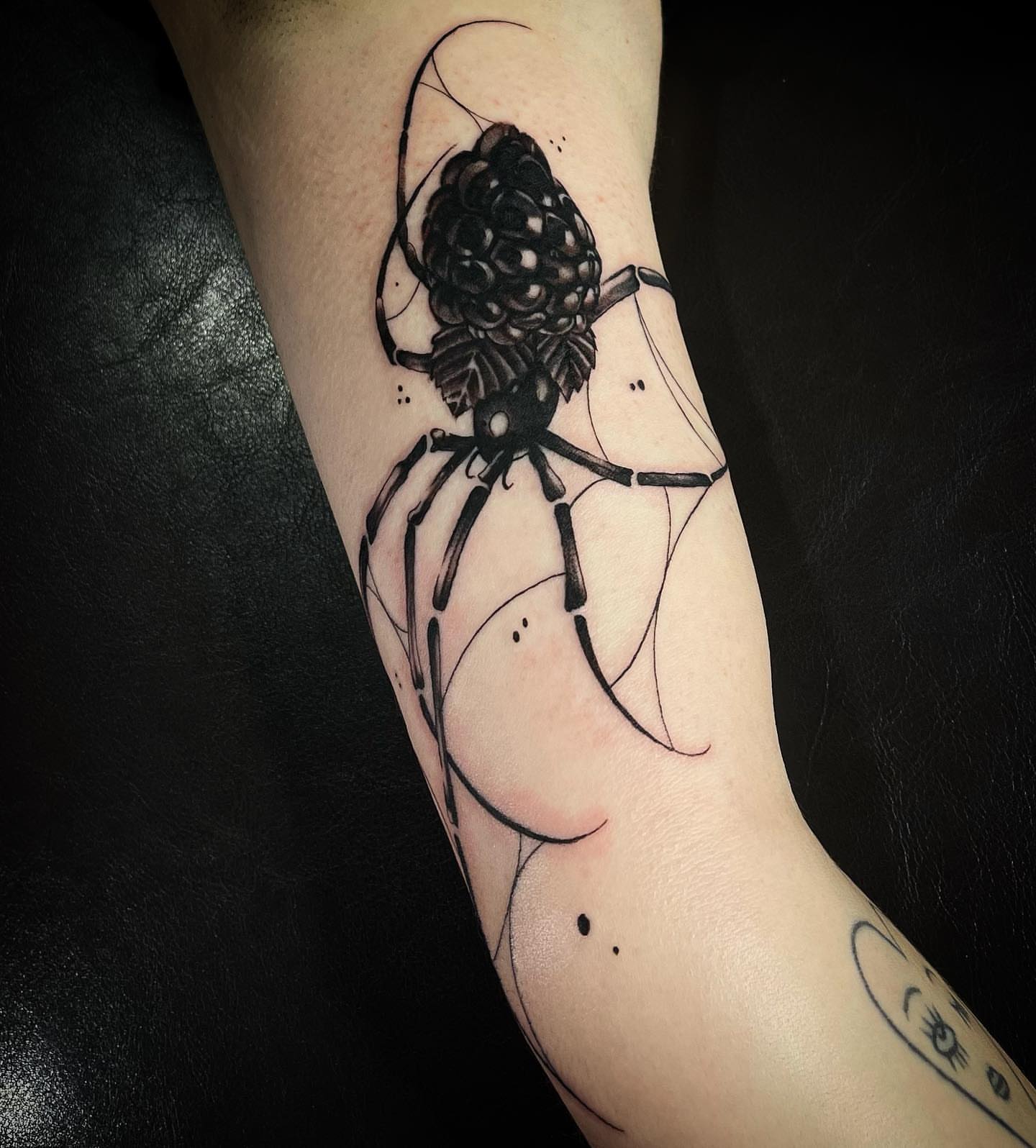 Spider black and grey tattoo on the forearm by @tattoos_by_elijah
