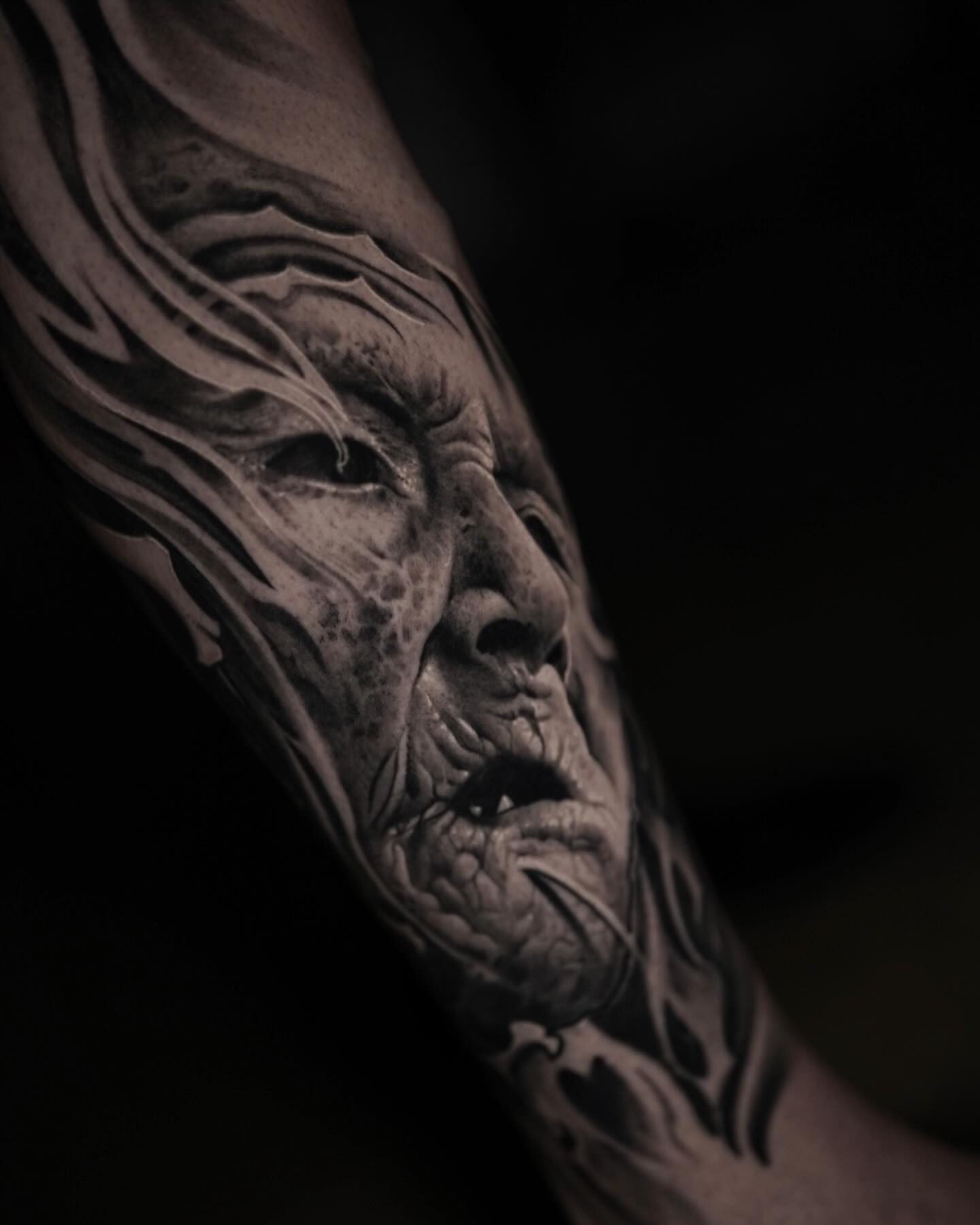 Aged face realism tattoo on the forearm by Victor Portugal Tattoo