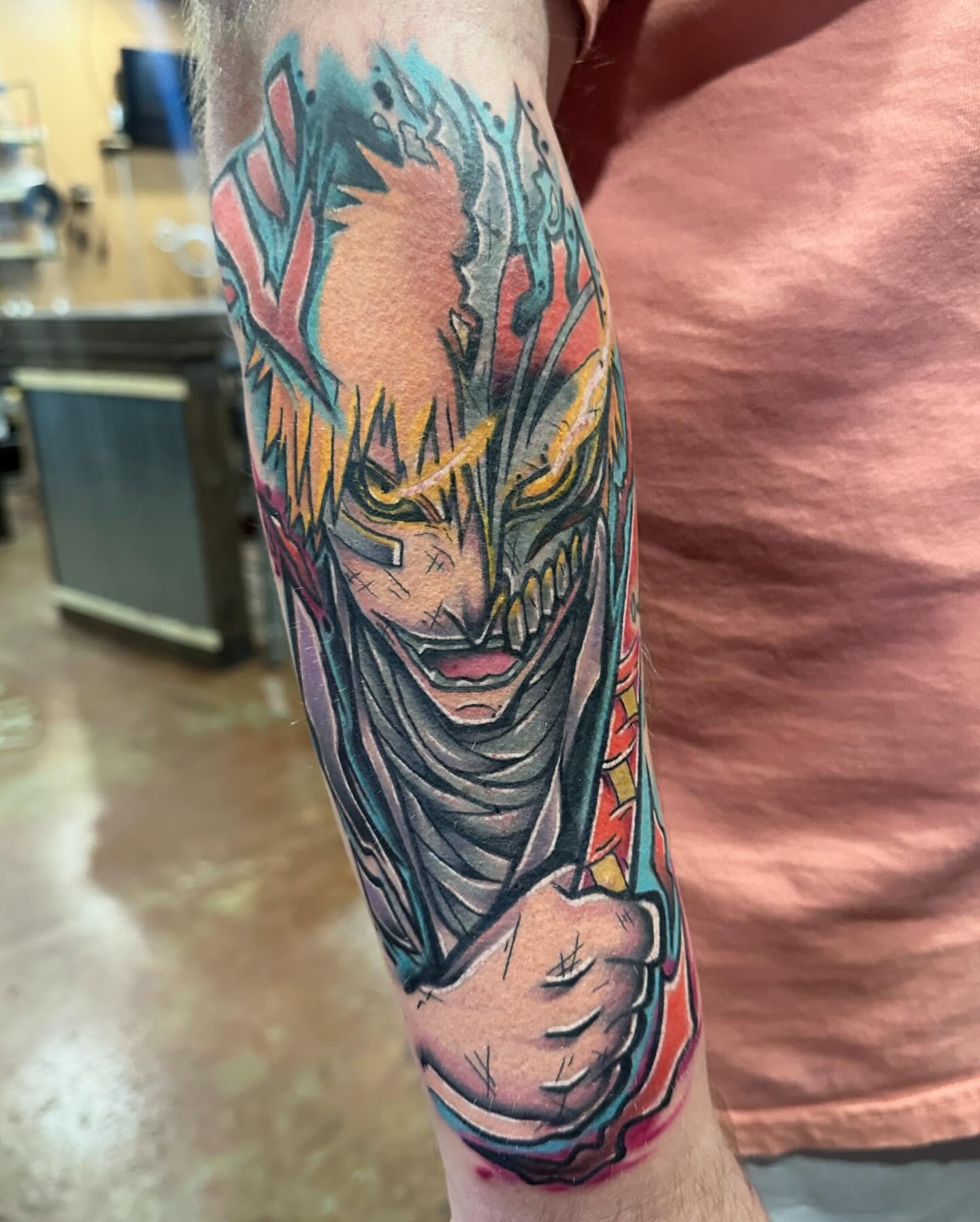Anime character anime tattoo on the forearm by Jeremy Thomas