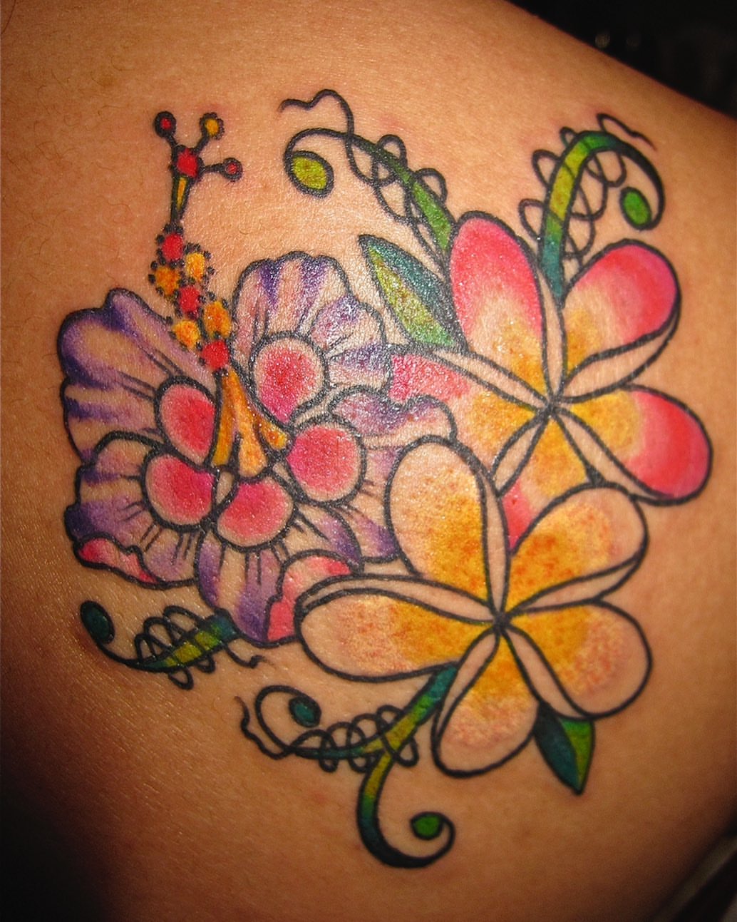 Floral bouquet new school tattoo on the shoulder by @colorrobbie