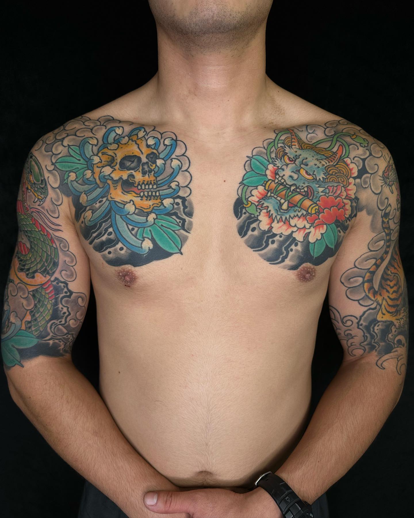 Skull and floral japanese irezumi tattoo on the chest by B e A U B R A D y, Costa Mesa, California