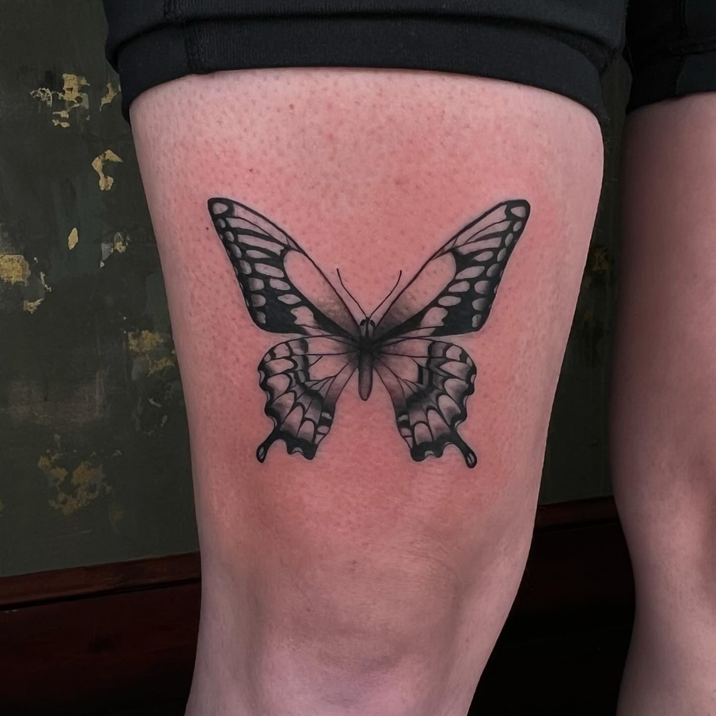 Butterfly black and grey tattoo on the thigh by ⊹ ࣪ ₊✩‧₊˚ 𝖘 𝖙 𝖊 𝖕 𝖍 𝖆 𝖓 𝖎 𝖊 ˚₊‧✩₊ ࣪ ⊹