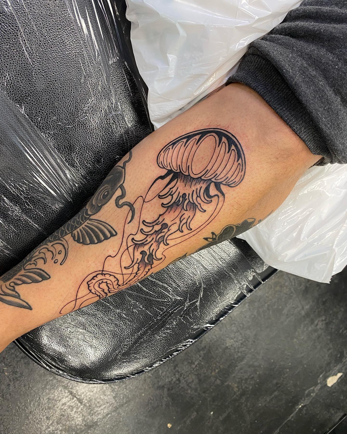 Jellyfish black and grey tattoo on the forearm by S C O T T
