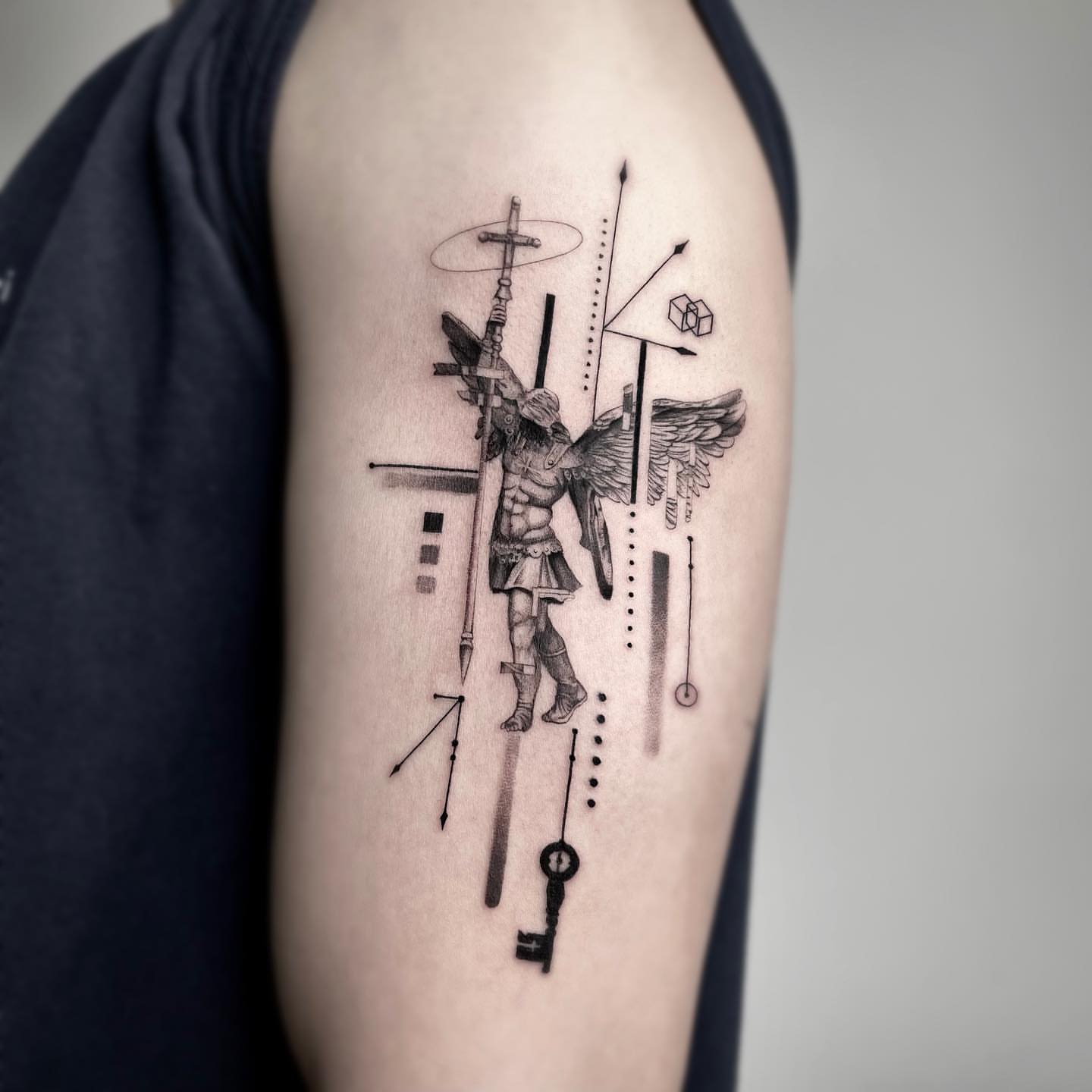 Angelic warrior geometric tattoo on the forearm by Seraph Geometry