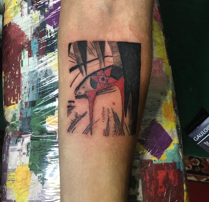 Eye and abstract shapes geometric tattoo on the forearm by la flamme
