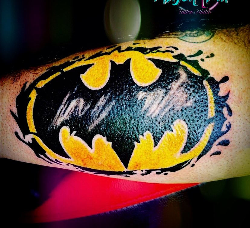 Batman logo dotwork tattoo on the forearm by @colorrobbie
