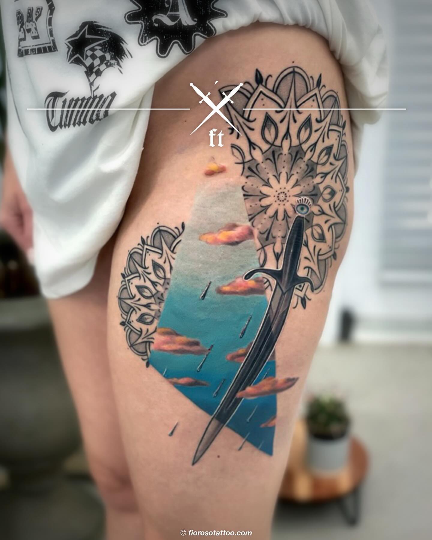 Sword and sky realism tattoo on the thigh by Jonathan Paul Fiore, Austin, Texas