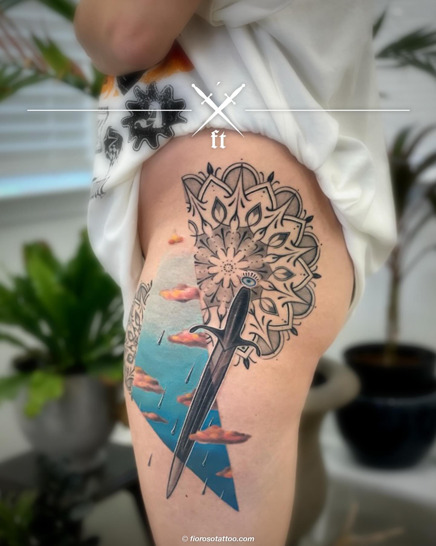Sword and mandala geometric tattoo on the thigh by Jonathan Paul Fiore, Austin, Texas