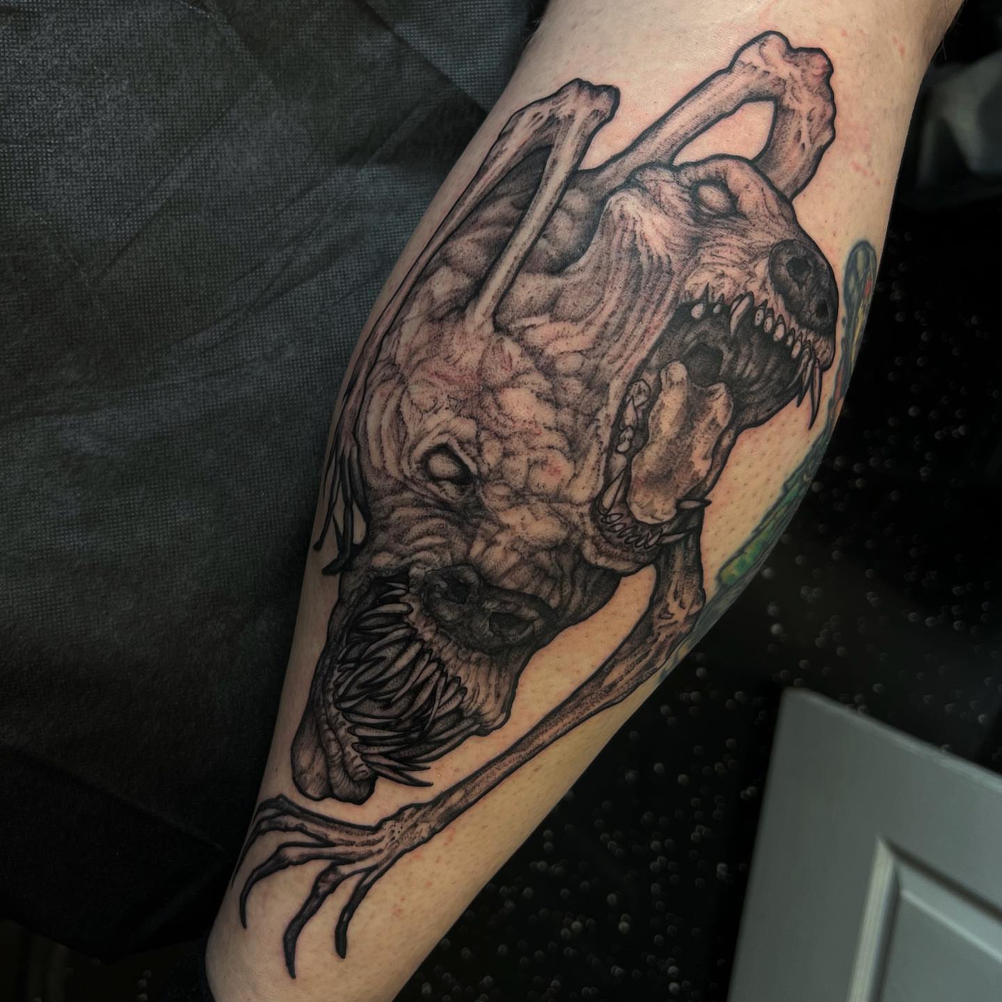 Zombie dark realism tattoo on the forearm by Kyle Black
