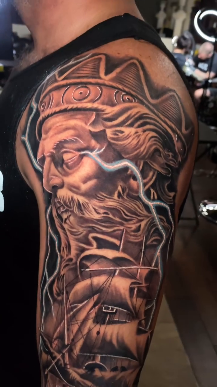Tattoo by @mrgrouchtattoos — realism, black_and_grey