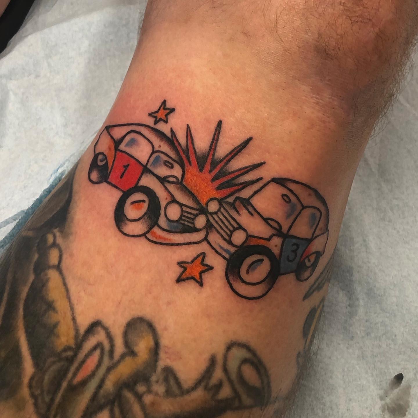 Car crash American traditional tattoo on the forearm by brenden