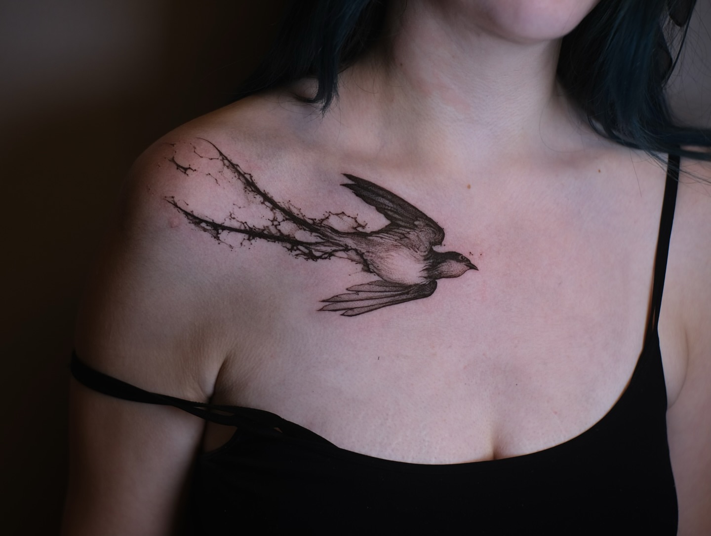 Bird realism tattoo on the shoulder by Strokin Konstantin