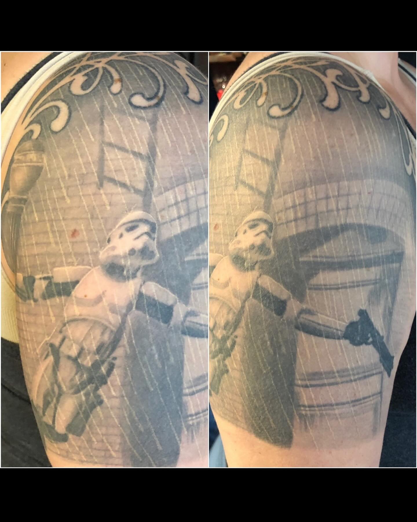 Stormtrooper black and grey tattoo on the upper arm by Patrick Delvar
