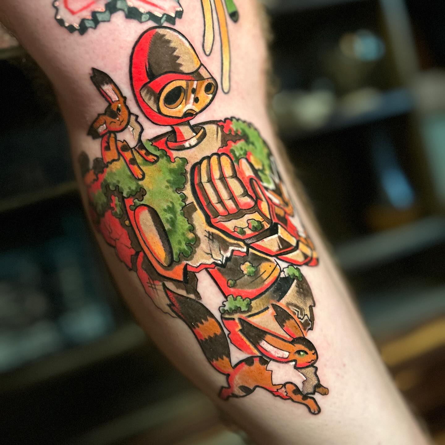 Robot and rabbit American traditional tattoo on the forearm by Rat Girl, Dayton, Ohio