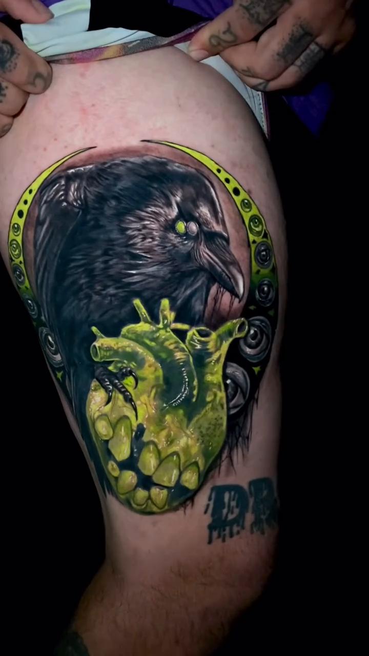 Raven and anatomical heart realism tattoo by Caitlyn Campbell