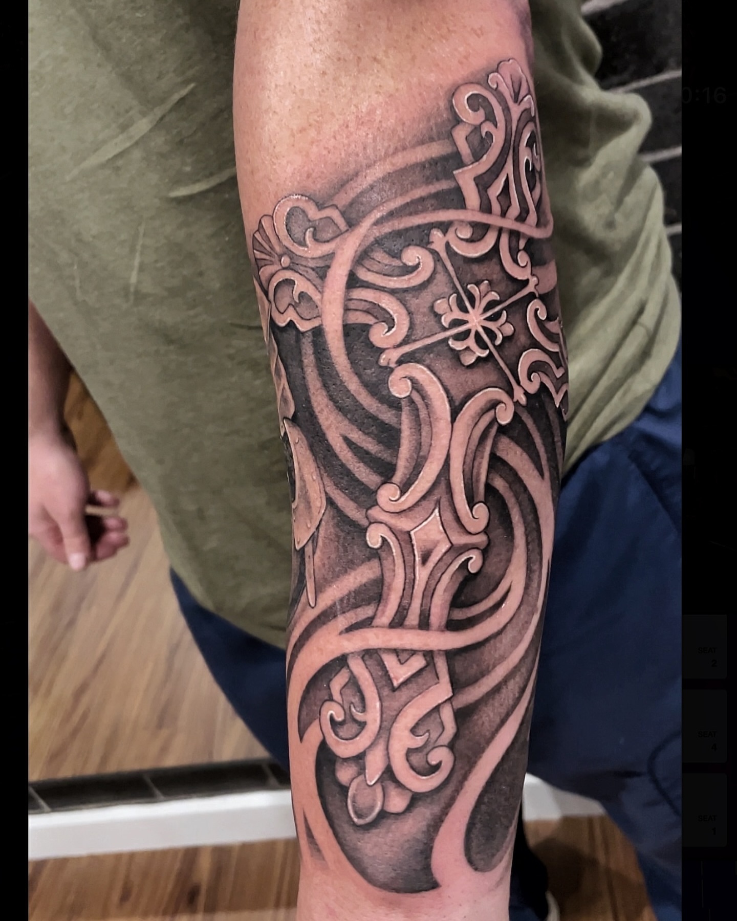 Scrollwork black and grey tattoo on the forearm by Elijah Forster - Nashville Tattoo Artist