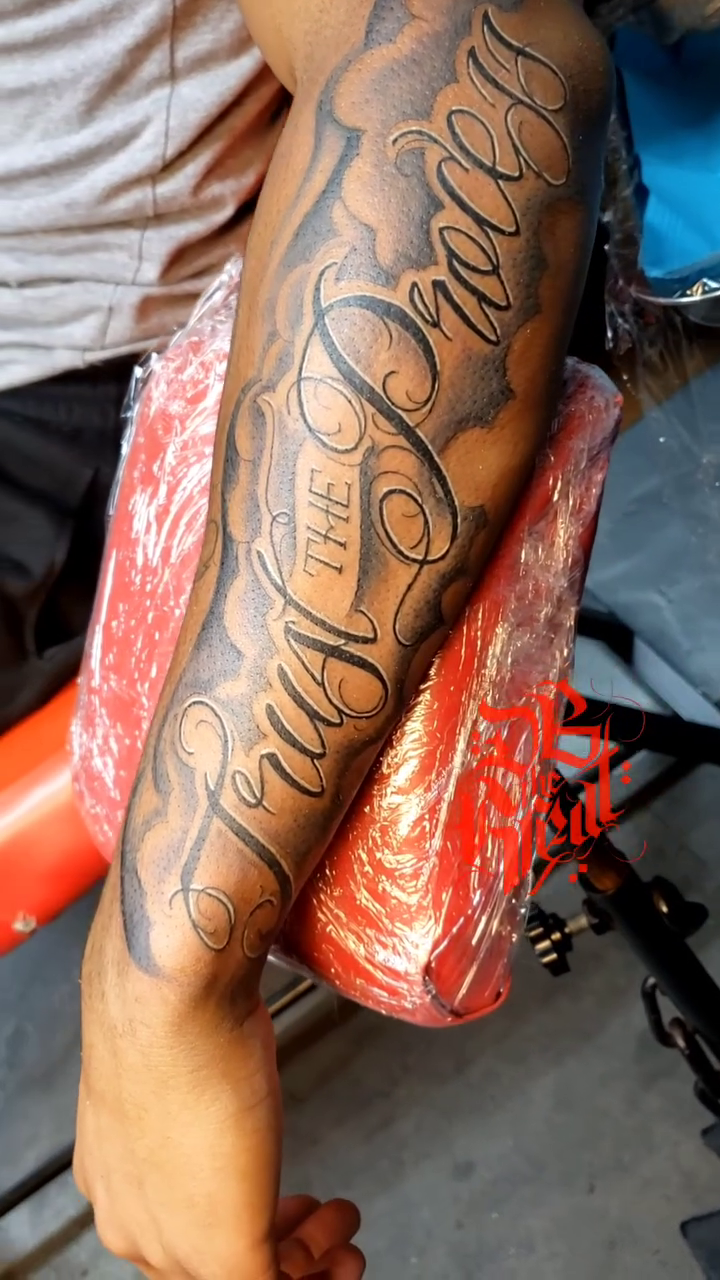 Trust the Process lettering script tattoo by Dannie Blythewood