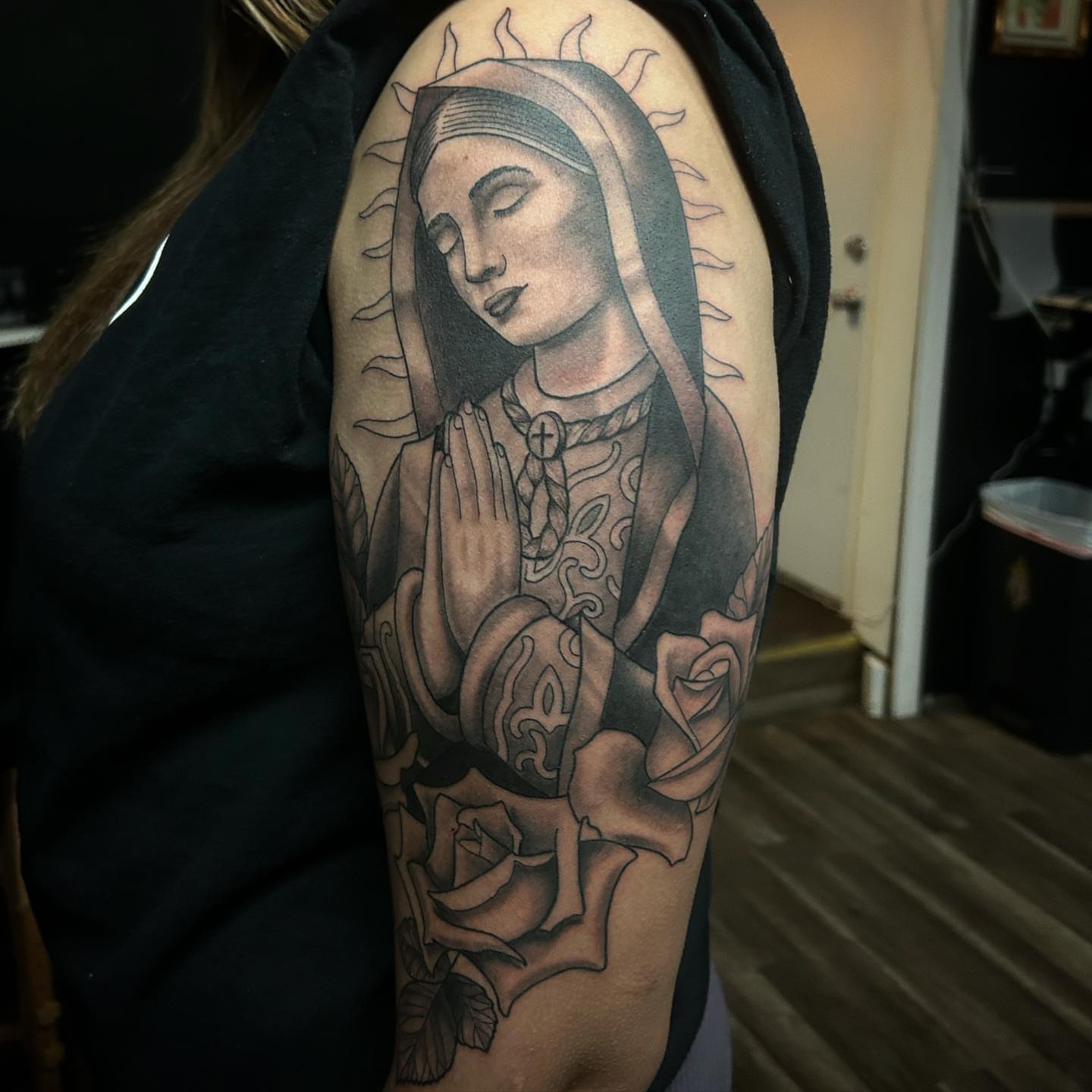 Our Lady of Guadalupe realism tattoo on the upper arm by Sean Cavanaugh