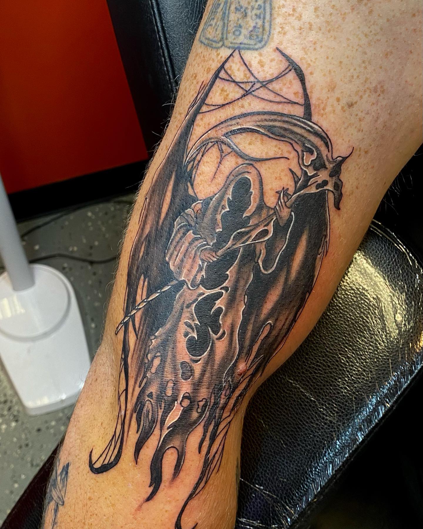 Grim reaper realism tattoo on the forearm by Maddie Neibert