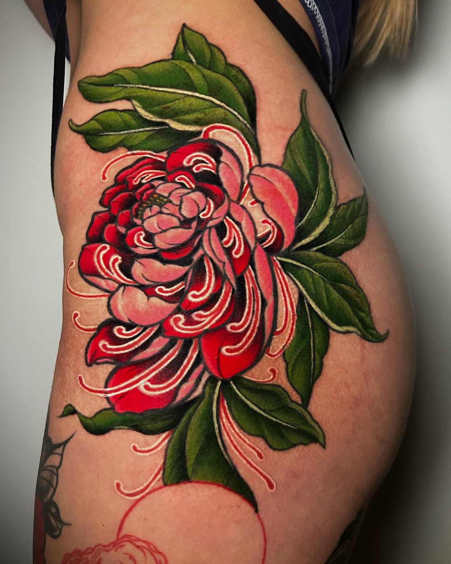 Peony American traditional tattoo on the thigh by Bradi