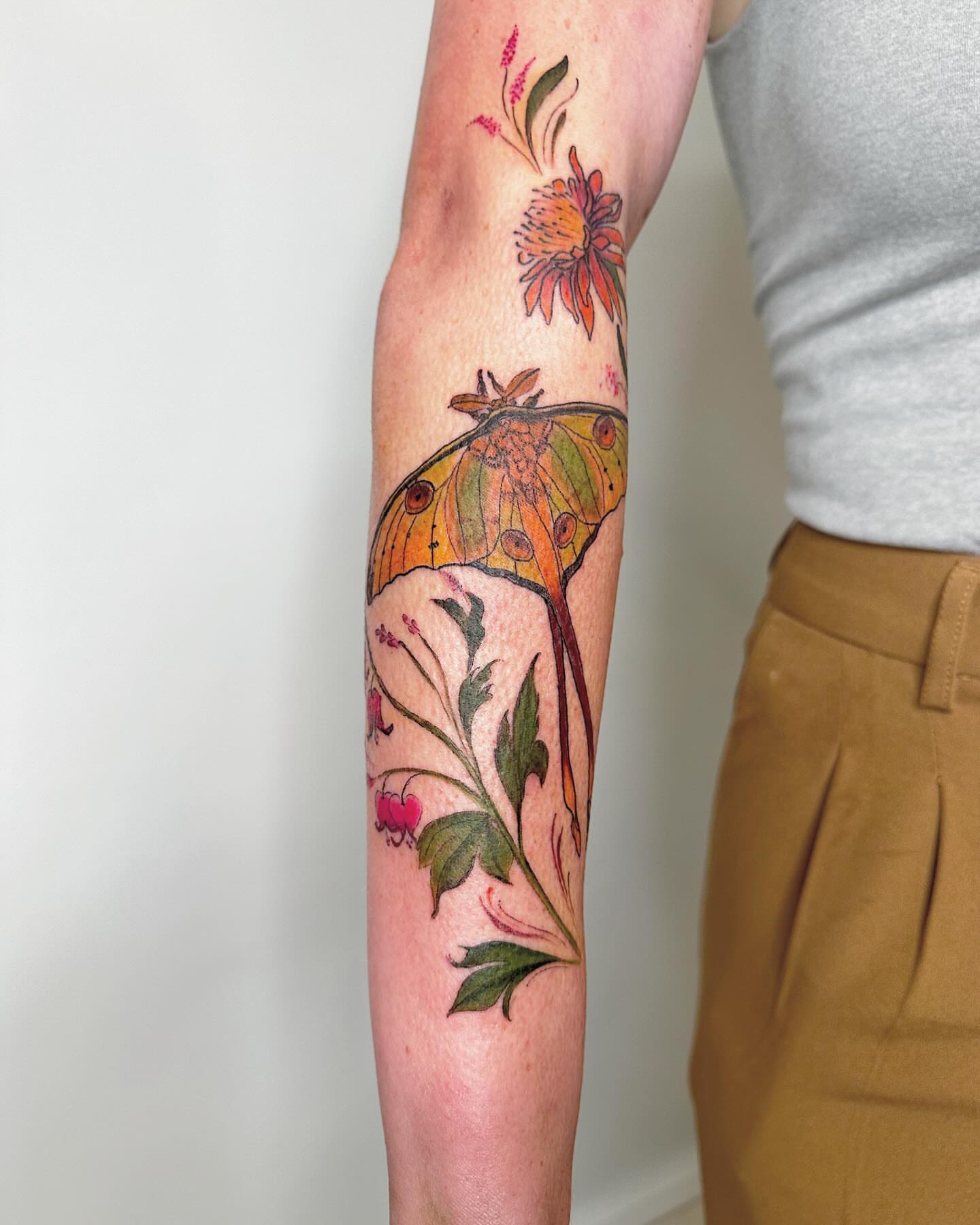 Butterfly and floral new school tattoo on the forearm by ๐ฌ๐๐๐๐๐๐ ๐ฟ๐๐๐๐๐๐, Dickson, Tennessee