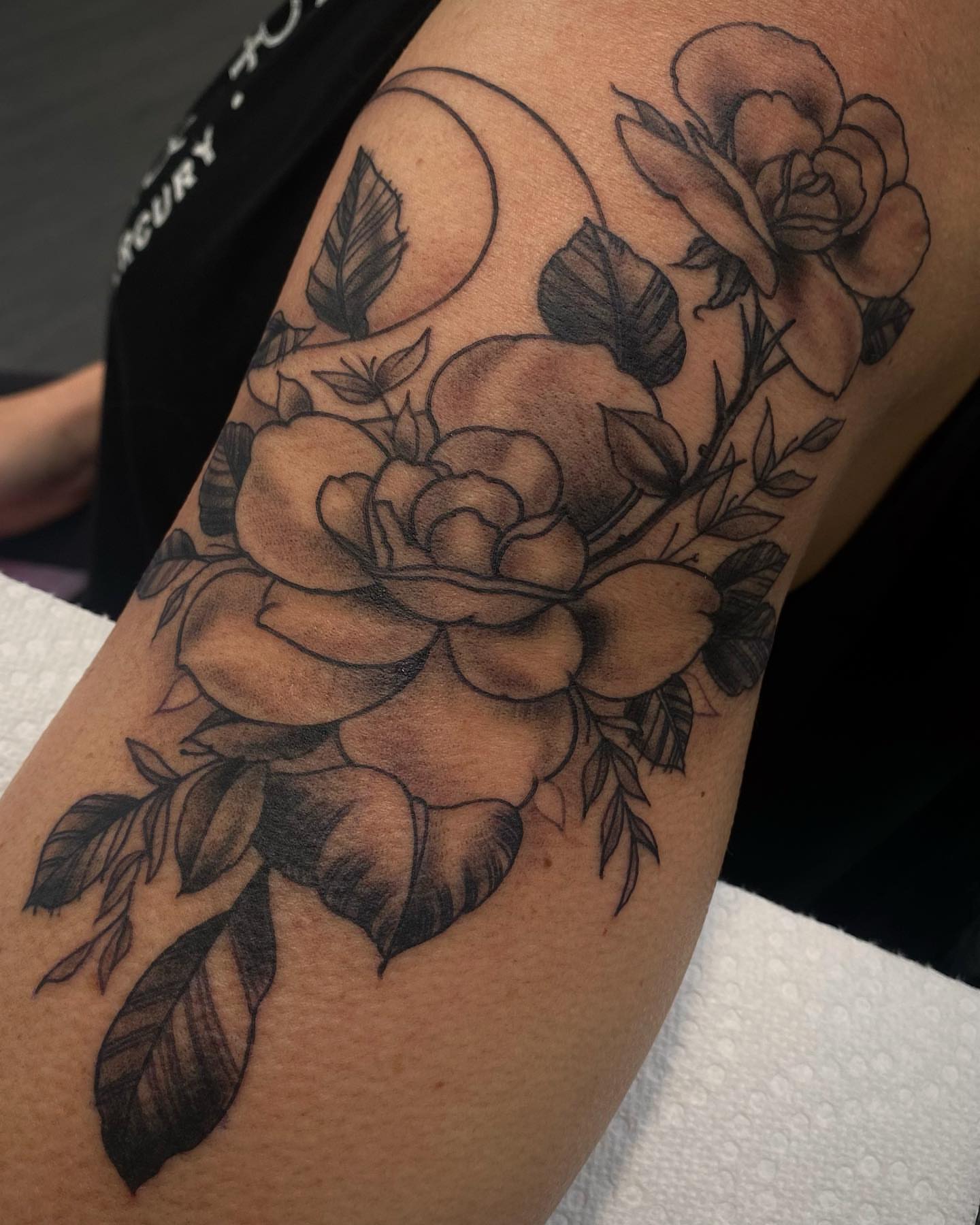 Roses black and grey tattoo on the forearm by Jesse Ortega
