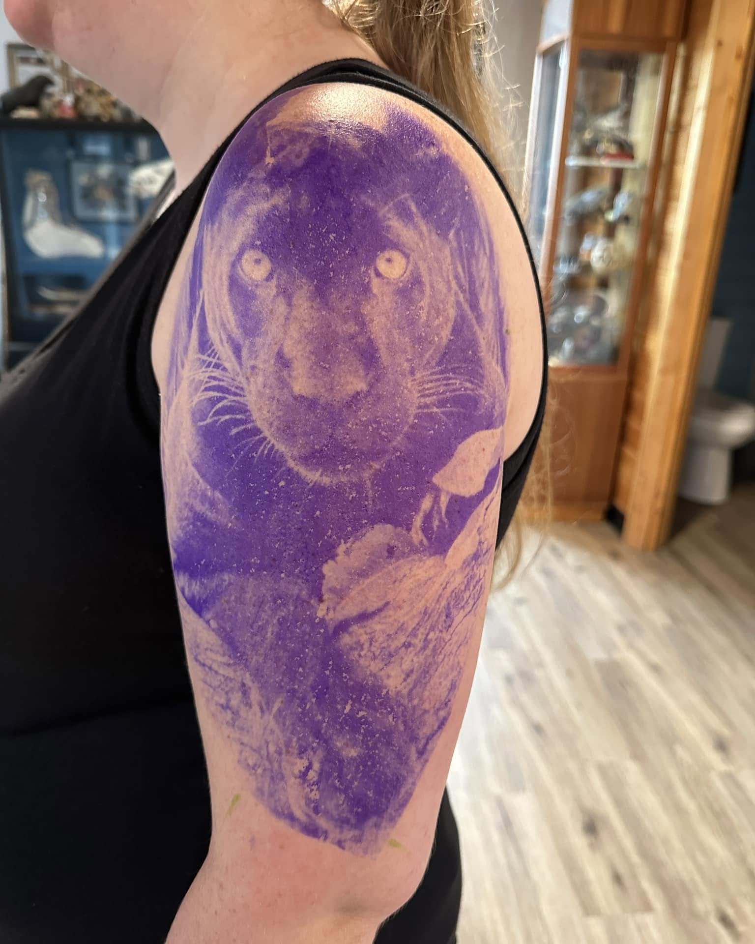 Lion realism tattoo on the shoulder by Nathan Froehlich