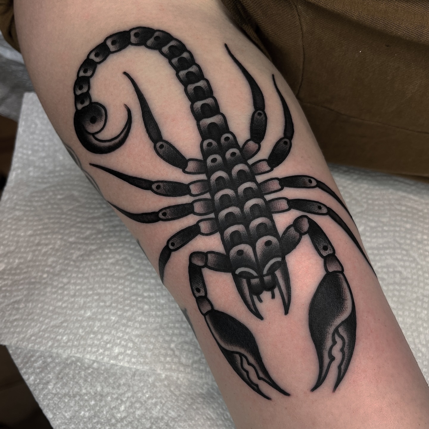 Scorpion black and grey tattoo on the forearm by John Lemon