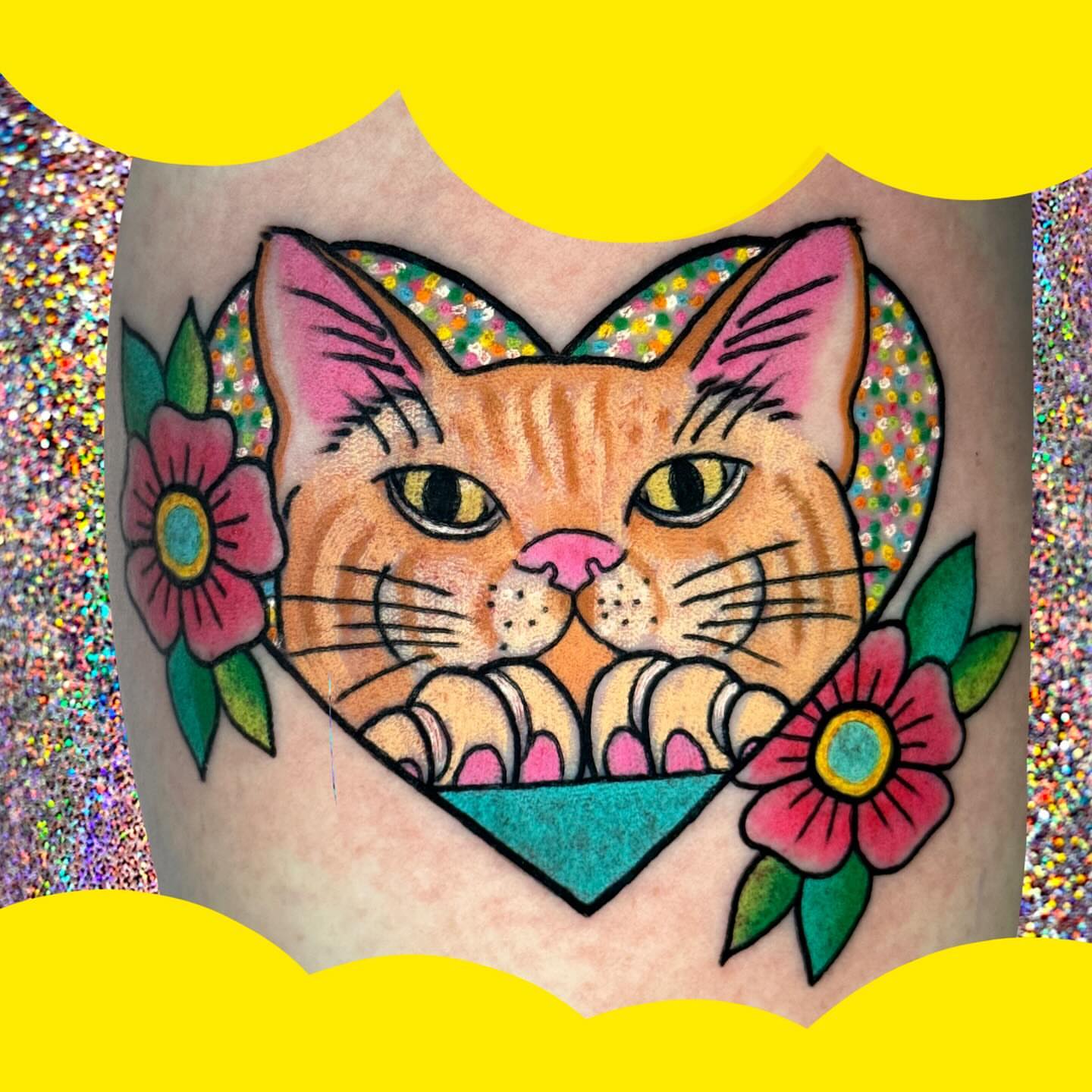 Cat American traditional tattoo on the forearm by Chelsea Lane