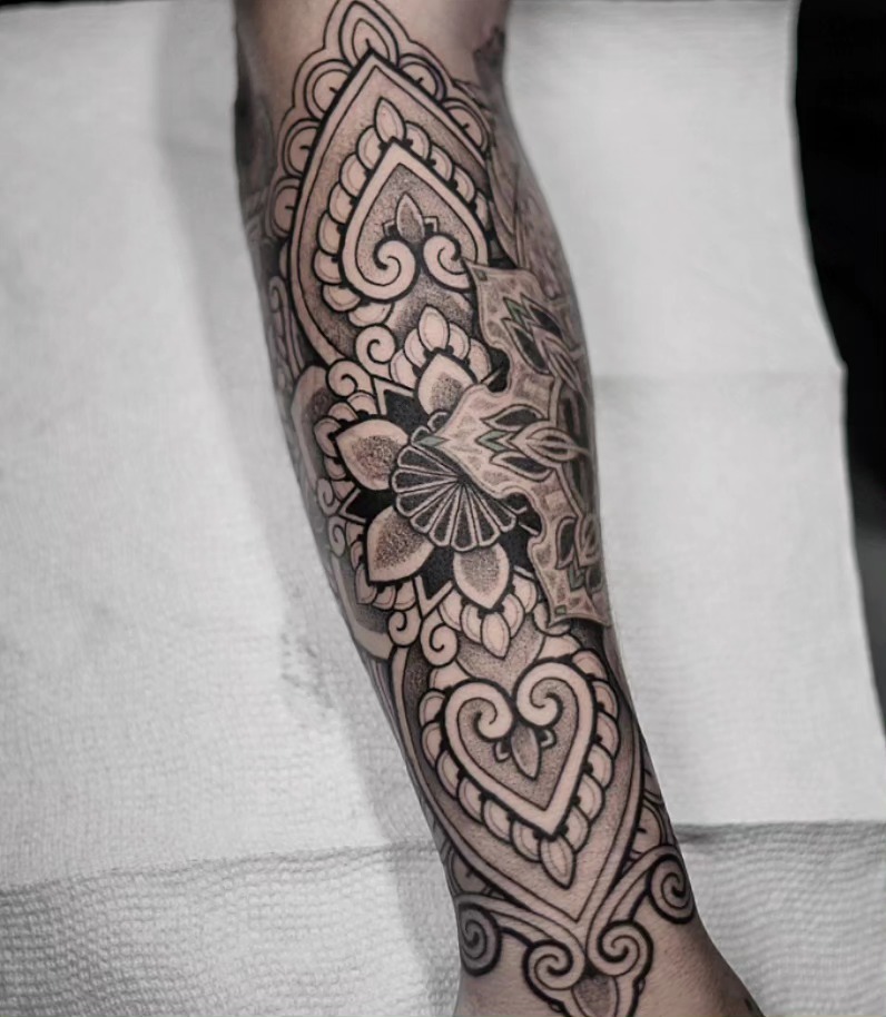 Floral mandala ornamental tattoo on the forearm by miami tattoo artist