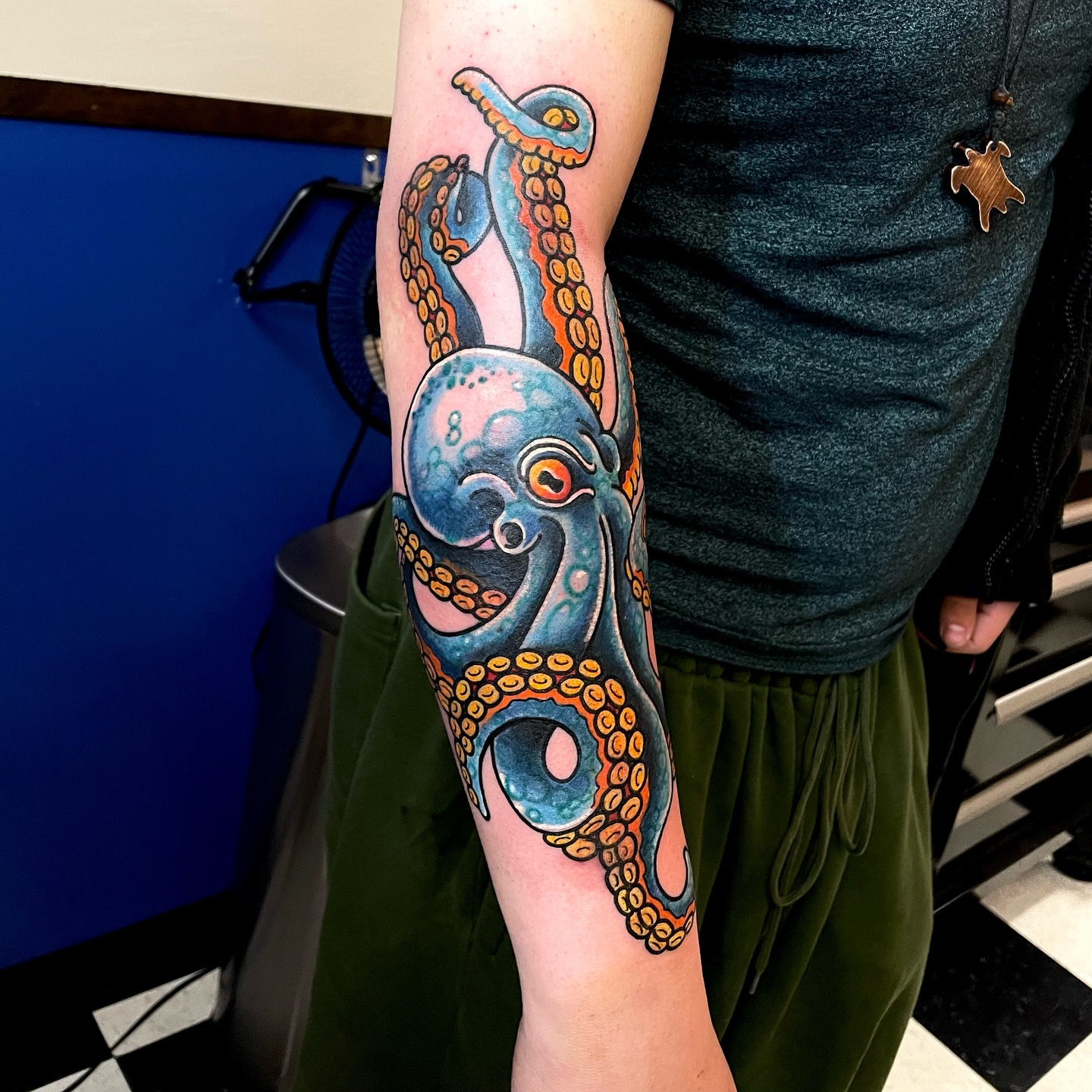 Octopus American traditional tattoo on the forearm by Don Robison