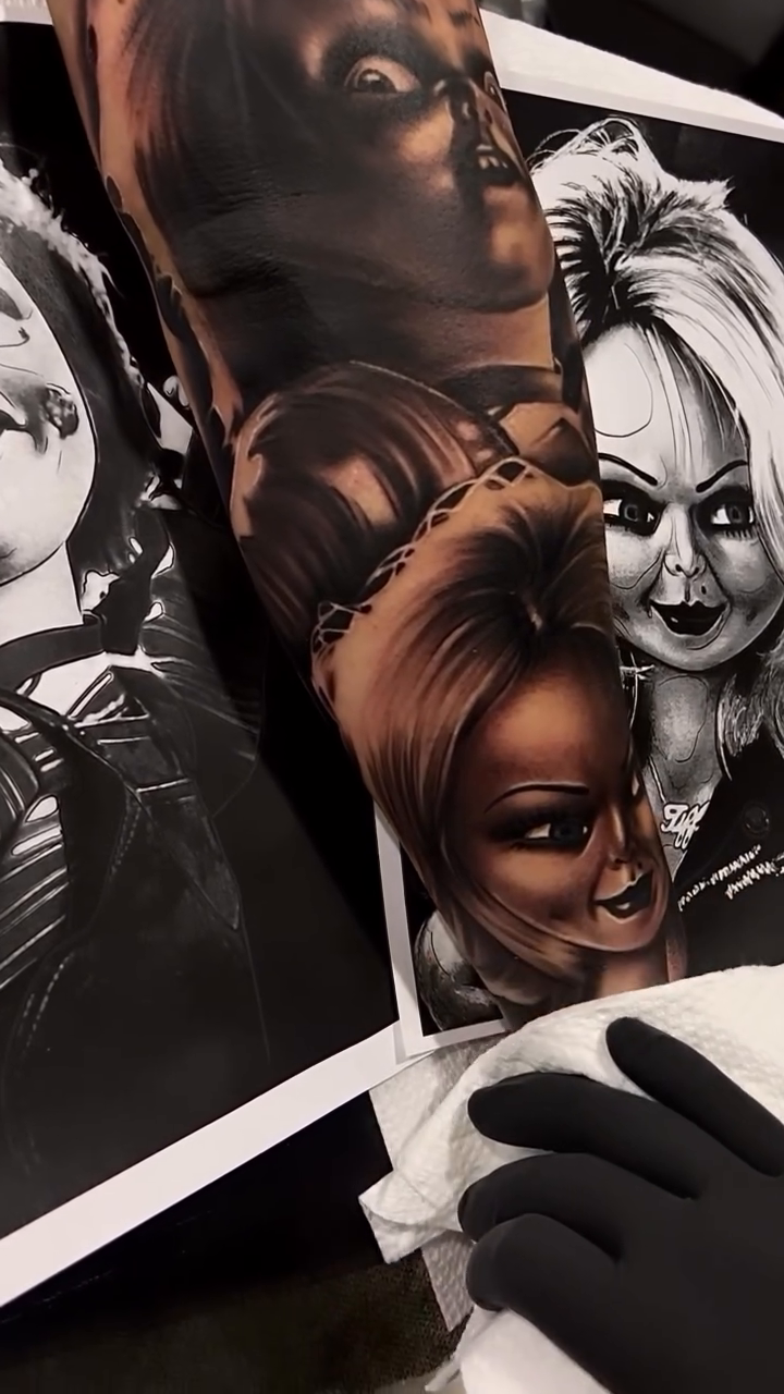 Chucky and Tiffany dolls realism tattoo by Tattoo