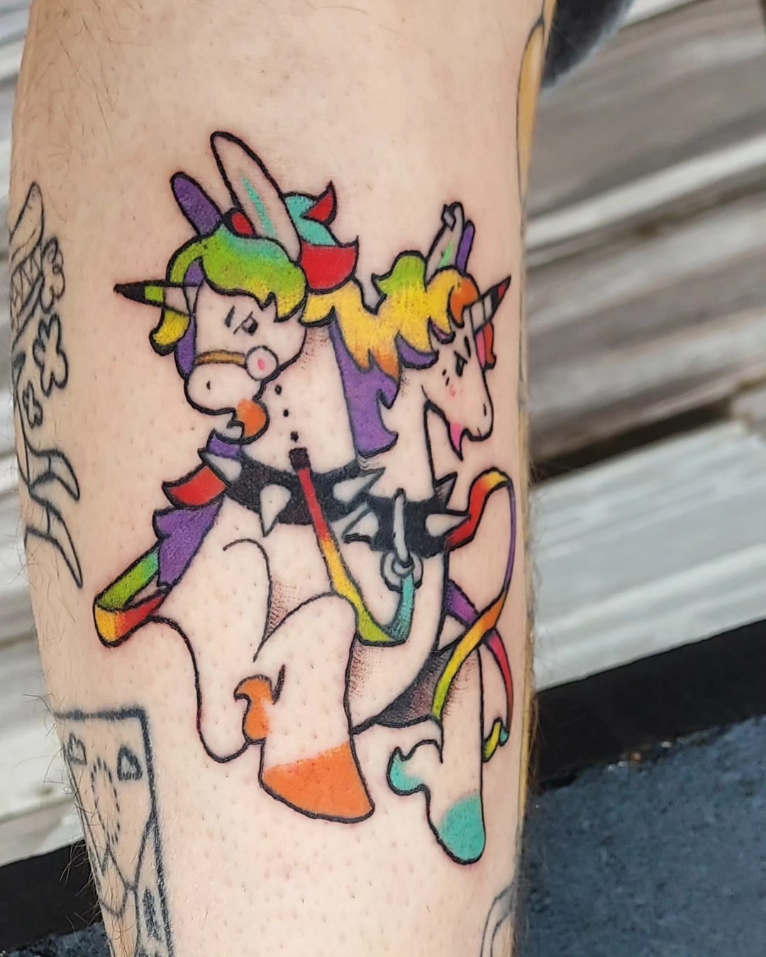 Unicorns dotwork tattoo on the forearm by Spike Cameron
