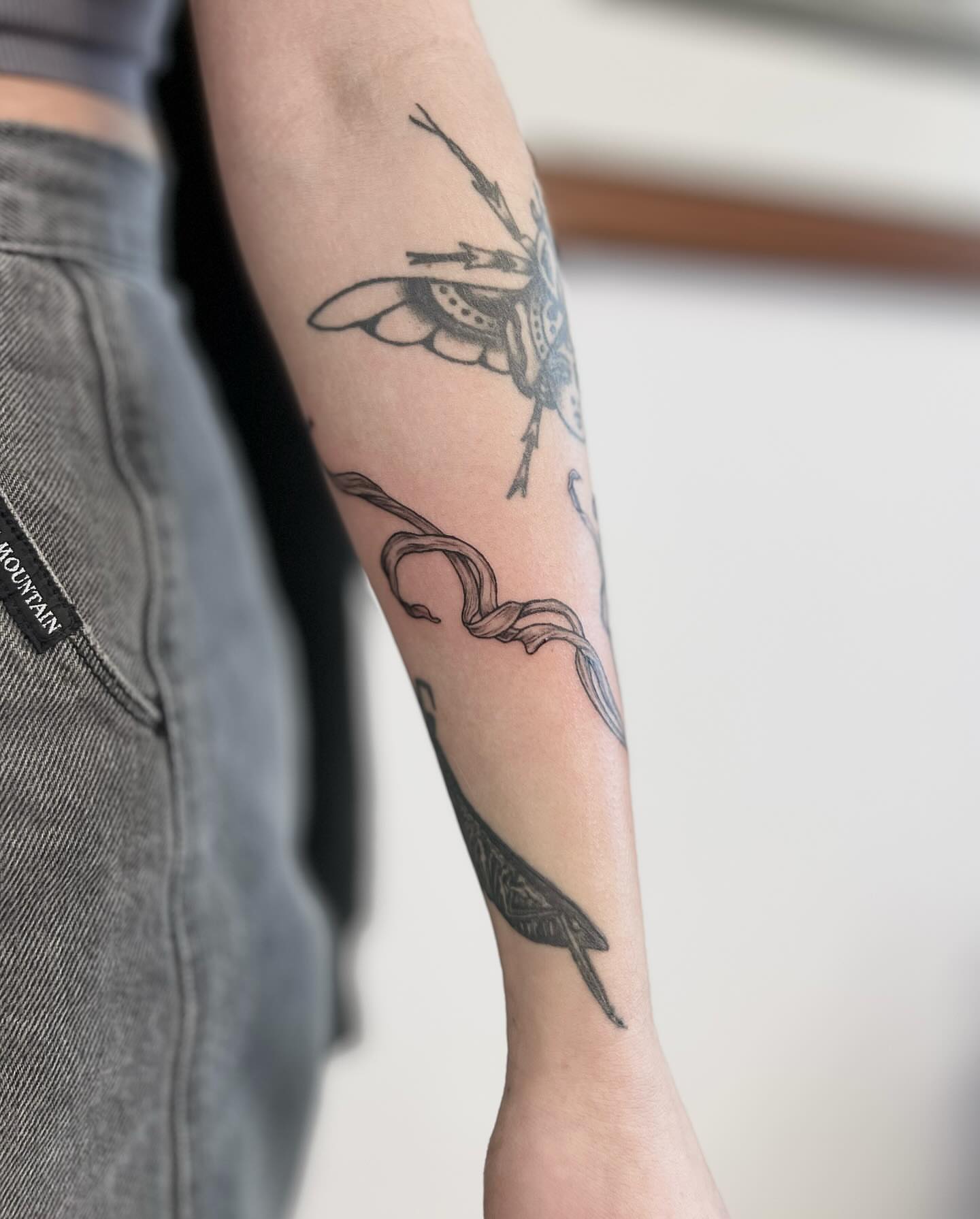 Insect black and grey tattoo on the forearm by πππ¦