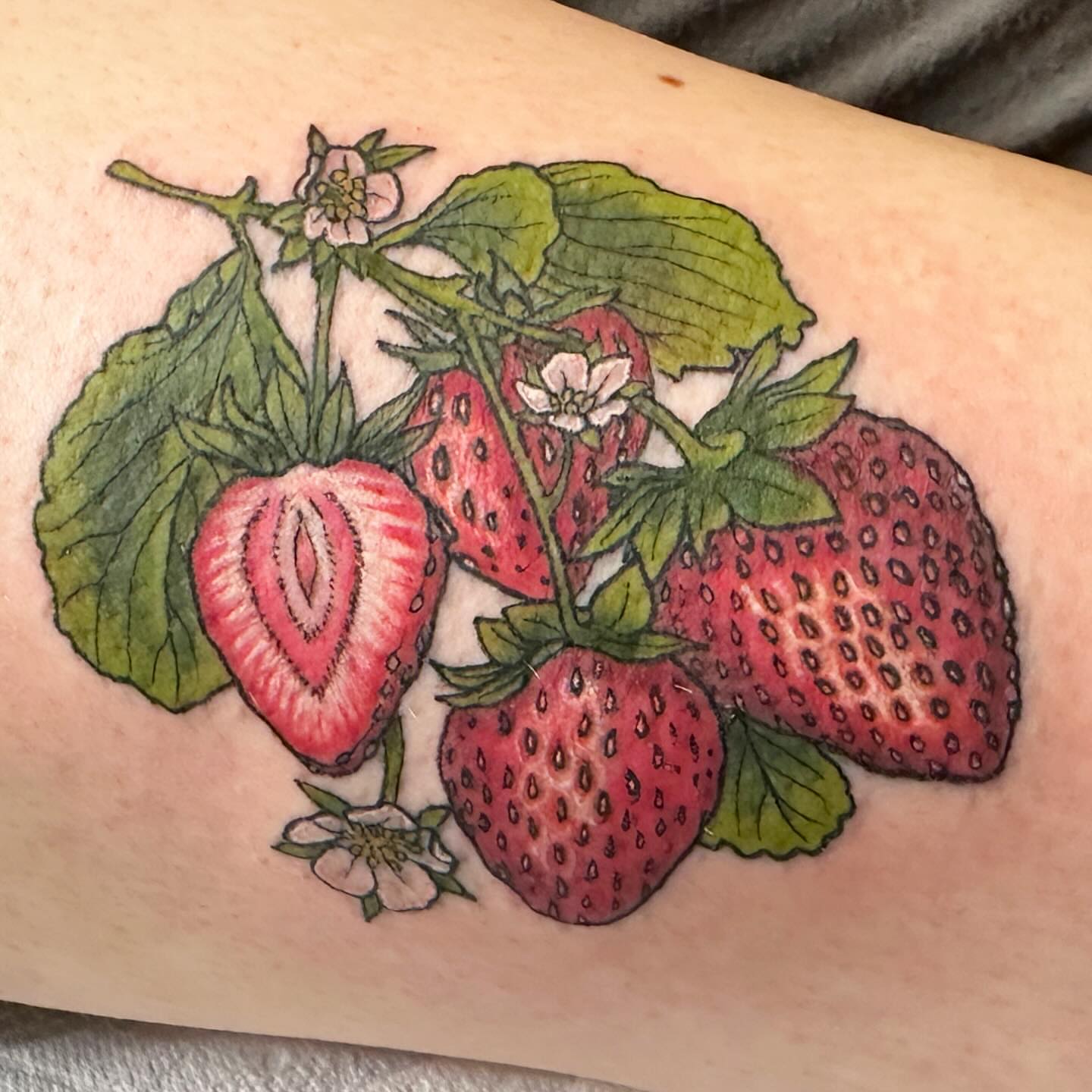 Strawberries realism tattoo on the thigh by ๐ฌ๐๐๐๐๐๐ ๐ฟ๐๐๐๐๐๐, Dickson, Tennessee